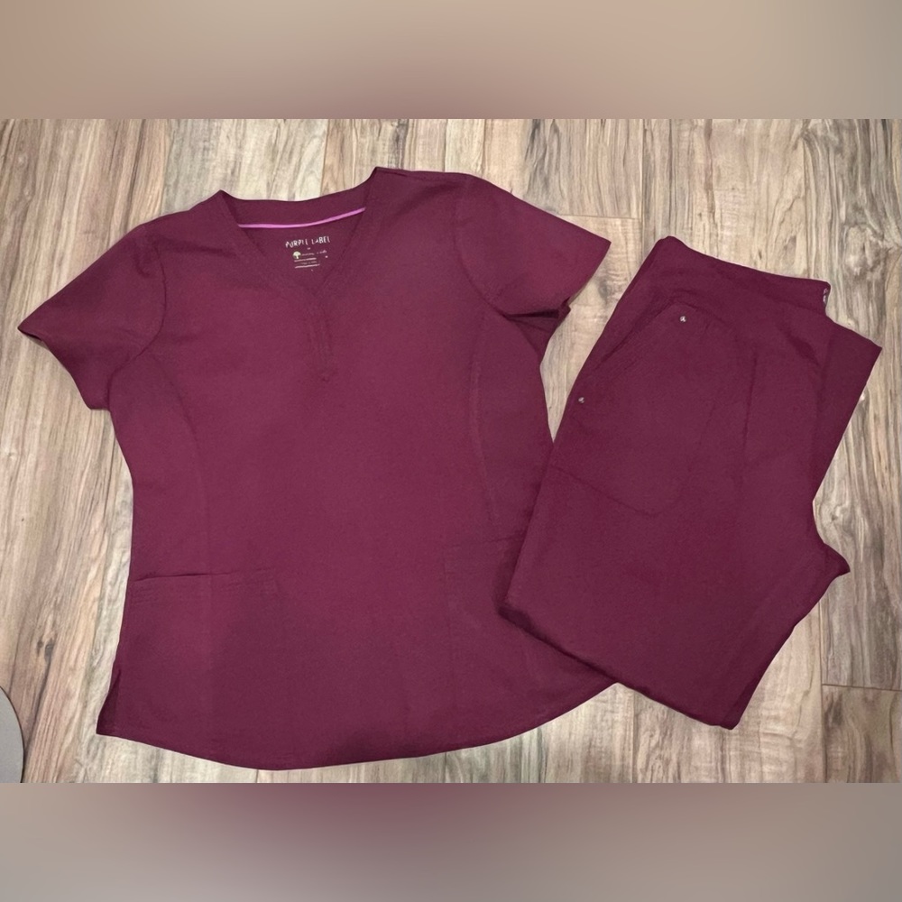 Women’s Healing Hands wine colored scrub set. Size M top, PL pants.